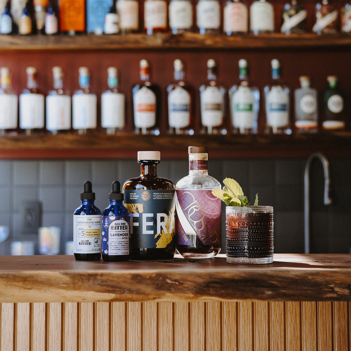 Rich Berry Bramble non-alcoholic cocktail featuring Feragaia Scottish spirit and muddled berries