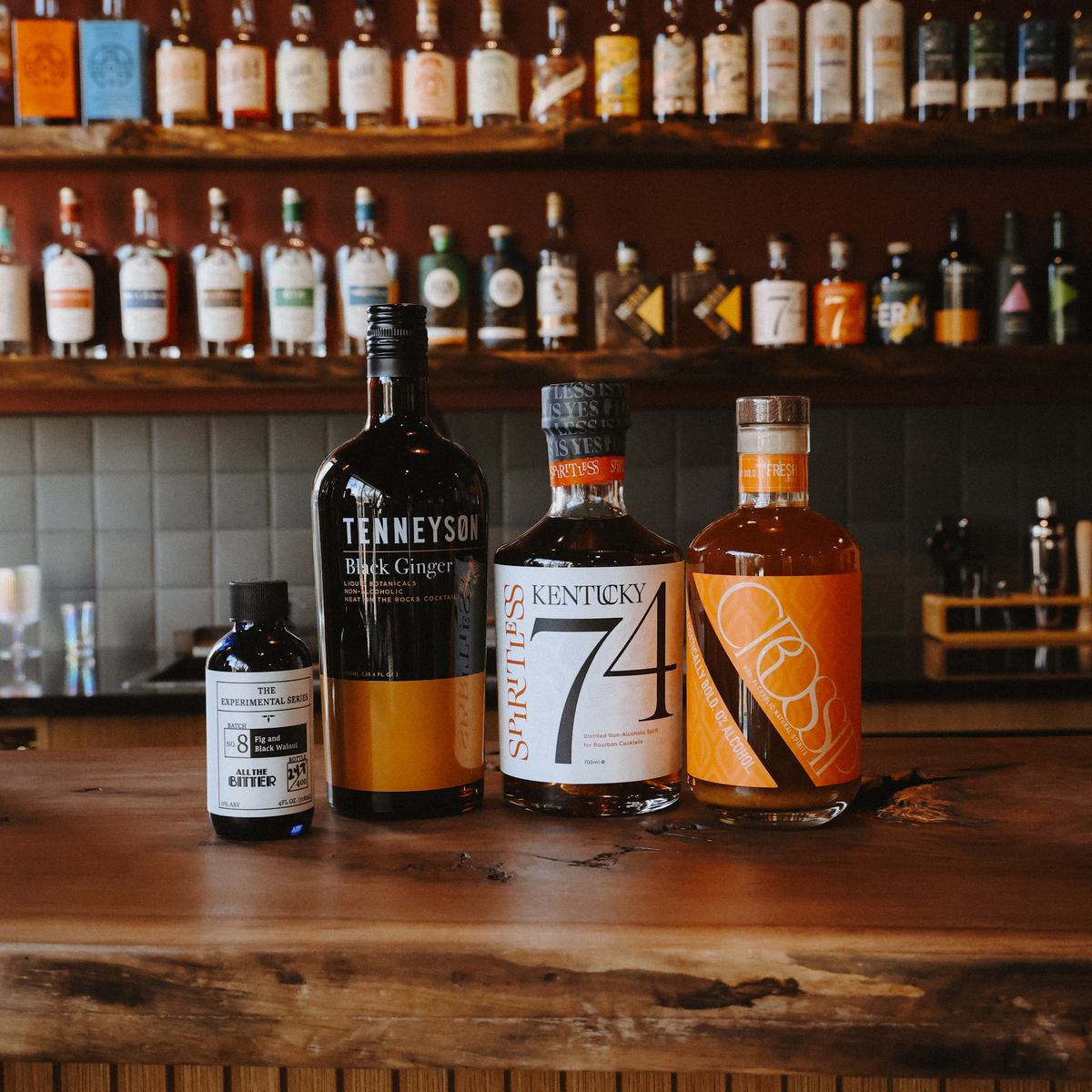 Black Citrus sparkling alcohol-free highball with activated charcoal and fresh citrus wheel