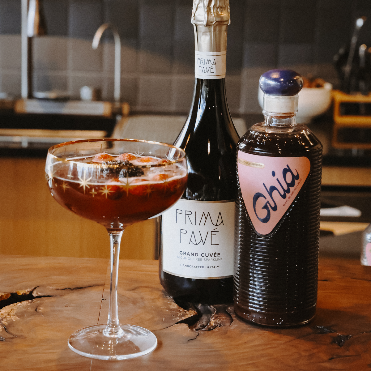 Winterberry Spritz festive non-alcoholic holiday cocktail in a wine glass with cranberries