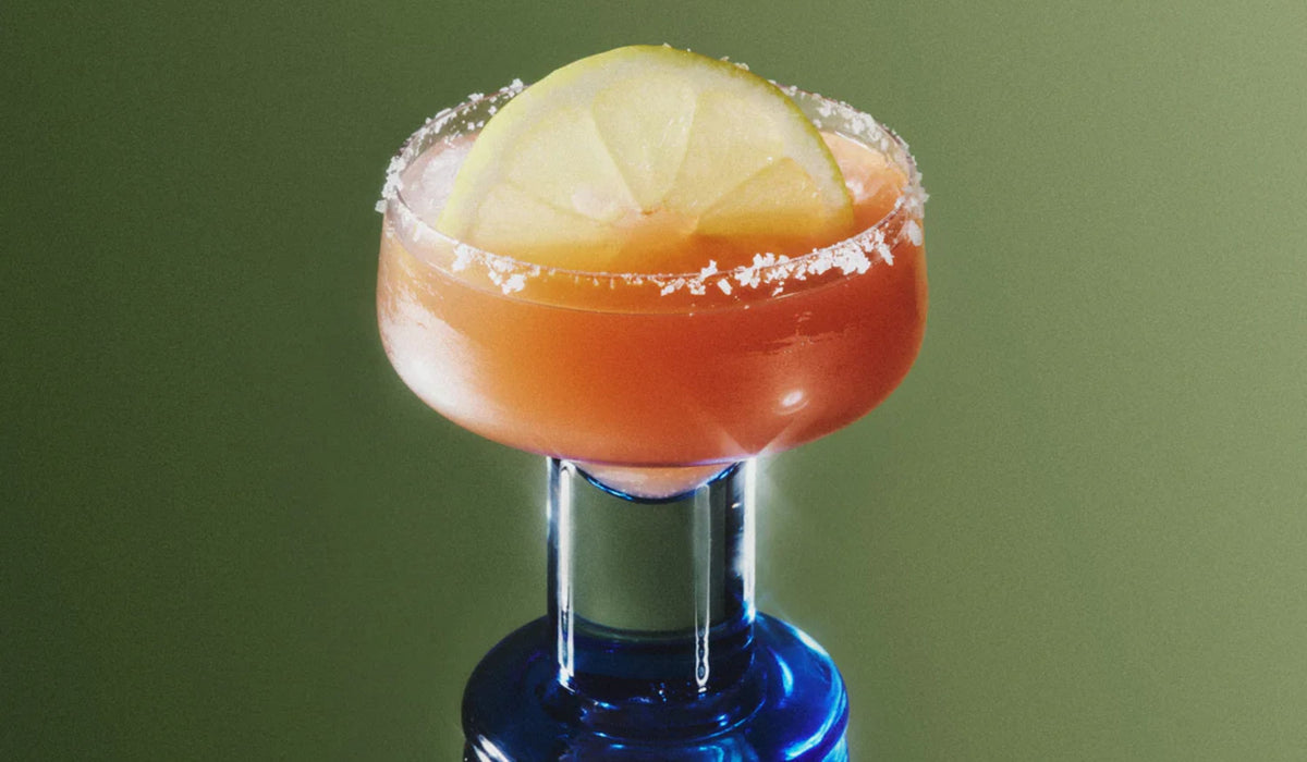 Ghia non-alcoholic bitter aperitif greyhound cocktail with fresh grapefruit juice
